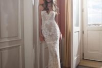 05 a strapless lace mermaid wedding gown with a deep neckline and a train for a sexy look