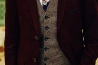 a vintage look with a burgundy velvet suit, a beige tweed waistcoat and a moody floral tie