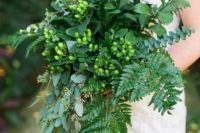 06 a cascading wedding bouquet with leaf fern, seeded eucalyptus, baby blue eucalyptus and hpericum berries