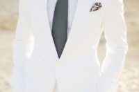 06 a pure white wedding suit with a white shirt and a grey tie for a touch of color