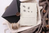 06 deckled edge natural wedding invitations with a handmade envelope and a bronze wax seal