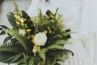 07 a chic wedding bouquet with ferns, leaves and white and yellow blooms is a unique idea
