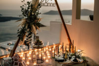 08 The picnic was overlooking the ocean, filled with candle light, boho rugs, Moroccan ottomans and greenery