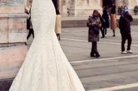 08 a strapless lace embellished mermaid wedding dress with a sweetheart neckline and a train
