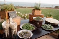 08 a toss bar – a table with herbs and petals in bowls and plates, let your guests choose