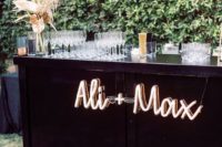 08 mark the wedding bar with neon names or monograms for a bold look and a personalized touch