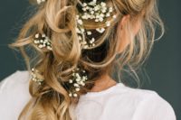 09 romantic tousled bridal braid adorned with baby’s breath looks ethereal