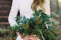 09 such a bold wedding bouquet with ferns and berries will contrast your white wedding gown