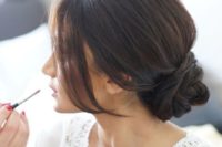 10 an elegant low bun with a bump and locks down will add chic to your bridal look