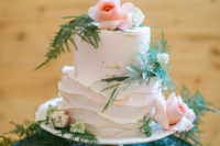 11 The wedding cake was a blush one with ruffles, gold edges and gold leaf plus blooms and greenery