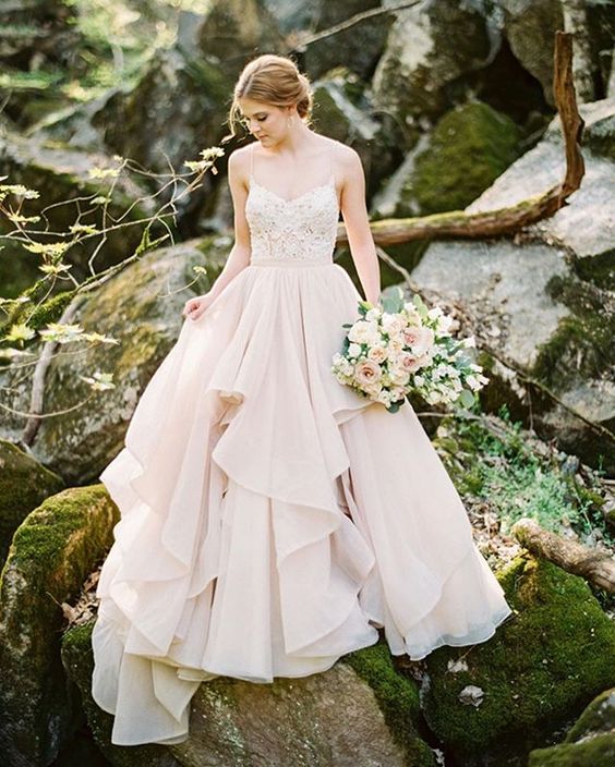 a glam bridal separate with an embellished spaghetti strap top and a blush ruffled maxi full skirt
