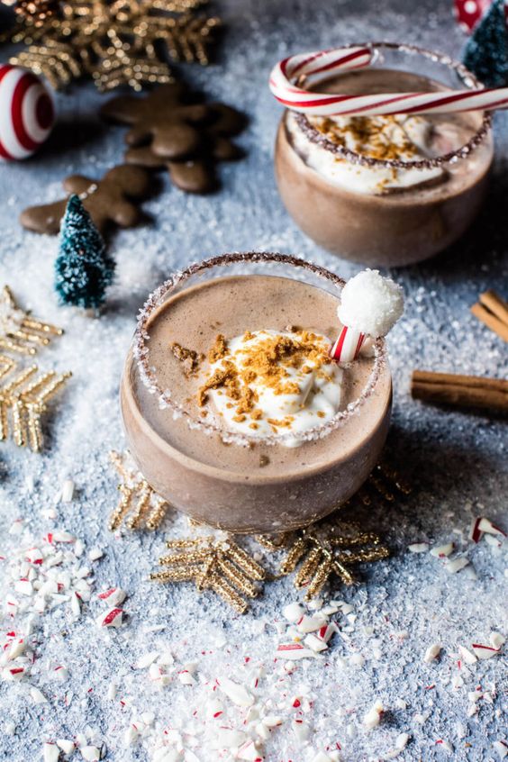 boozy chocolate Christmas gingerbread cocktail with a candy cane and marshmallows