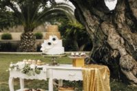 11a gold sequin tablecloth can be also used to spruce up your dessert bar