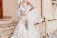 12 a blush strapless mermaid wedding gown with white lace and a train for a statement