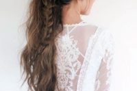 12 a long textural ponytail with a large braid and a bump looks truly boho chic