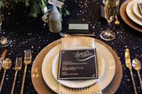 15 a black sequin tablecloth plus touches og gold glitter is what you need for a starry night wedding