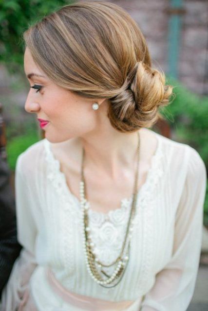 a low twisted bun is a chic and classic idea that never goes out of style