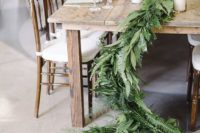 15 a simple leafy table runner with ferns for a rustic or natural table setting will bring texture