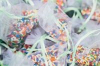 15 colorful sprinkles intead of usual conmfetti to add a fun touch and sweetness to your wedding exit