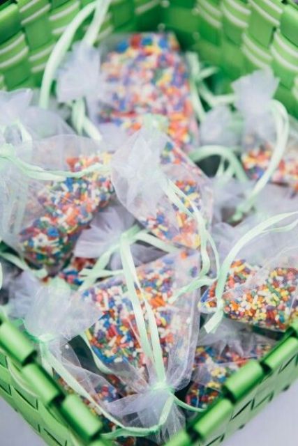colorful sprinkles intead of usual conmfetti to add a fun touch and sweetness to your wedding exit