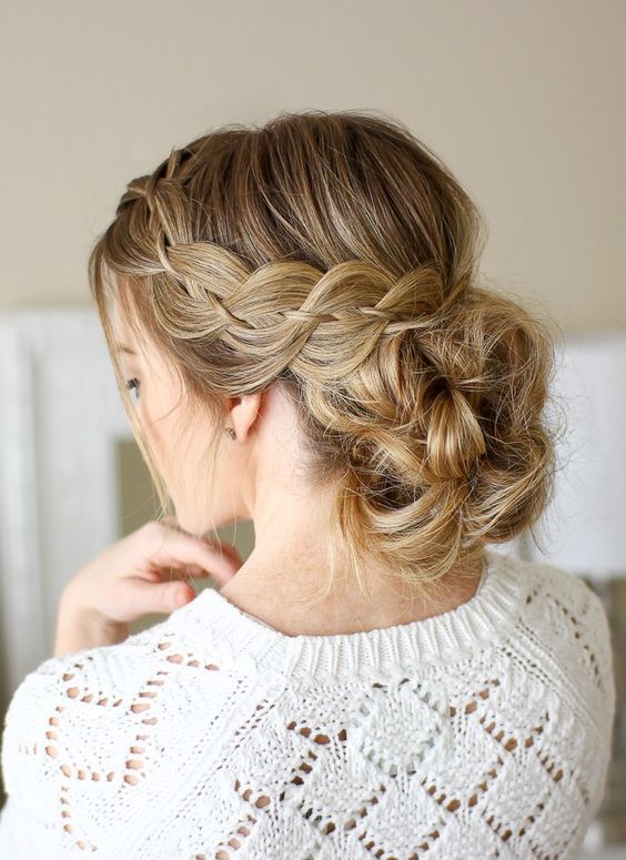 a four strand braid low bun with a bump and a touch of mess is an amazing idea for a boho bride
