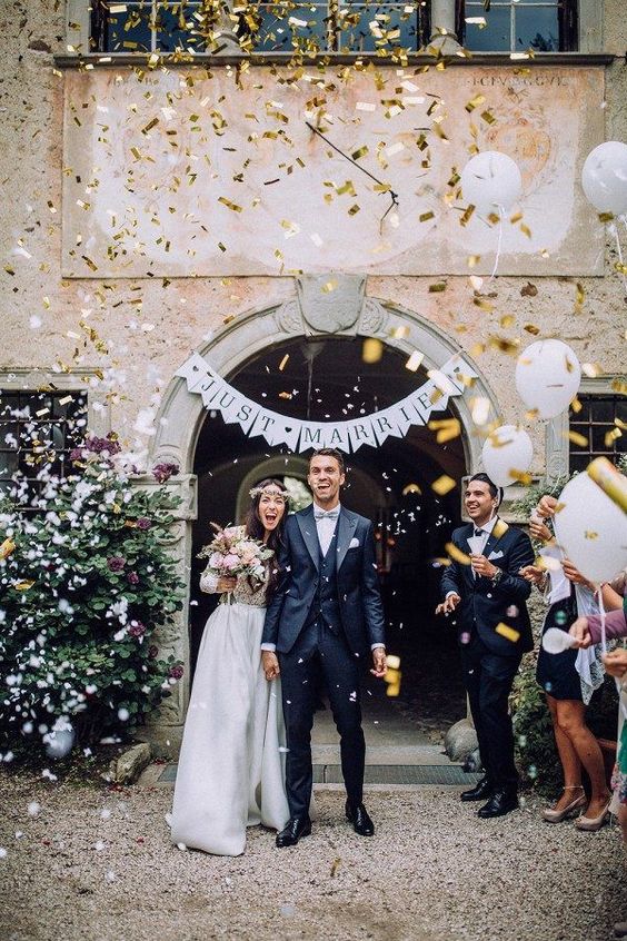 large gold confetti is a cool idea for any glam wedding or just to glam up the space a lot
