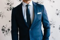 18 a perfectly tailored blue suit with a polka dot tie is what you need for a flawless look