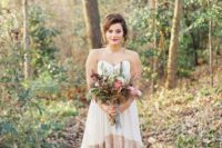 19 a modern glam strapless wedding gown with a plain top and a partly gold sequin skirt for a fall wedding