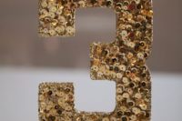 20 a gold sequin table number is a chic idea for many wedding themes and styles