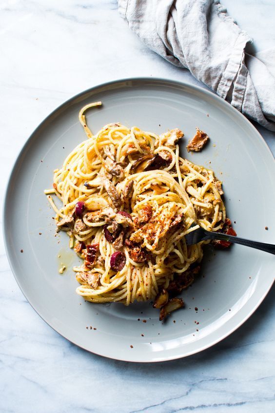 creamy goat cheese and sun-dried tomato pasta with roasted garlic and mushrooms