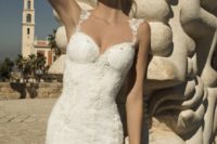 22 a lace embellished mermaid wedding dress with lace straps and a train for a luxurious look