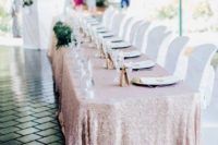 22 a pink sequin tablecloth is ideal for a modern glam wedding or to add a bit of glitter to your venue