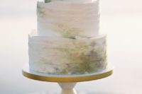 24 a ruffle wedding cake done in white and coastal shades – green, purple, yellow