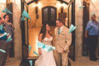 24 paper planes are a whimsy and fun idea and will add a dreamy touch to your wedding exit