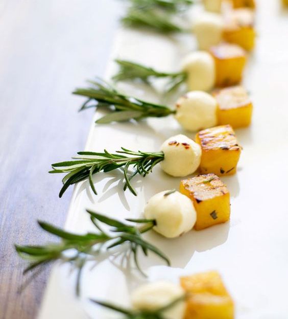 rosemary pineapple mozzarella bites are perfect one bite appetizers and many guests willlove this combo