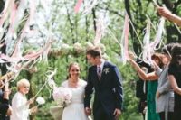 26 ribbon wand send off is another cool and fun idea for your wedding exit and they won’t land on your dress