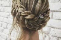 a braided updo with some locks down is ideal for a boho chic or just relaxed outfit