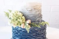a chic ombre blue wedding cake decorated with real blooms and greenery is a lovely solution for a vintage-inspired wedding