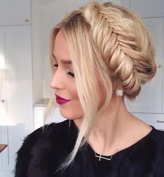 a fishtail braid updo with some locks down is a very trendy and fashionable option