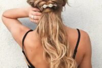 a twisted braided half up ponytail accented with a geometric hairpiece is a cool and catchy idea for a modern wedding