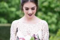 an aubergine lip is a bold and non-traditional idea and is a great way to stand out a lot on your big day