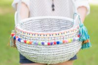 DIY boho basket with pompoms and tassels