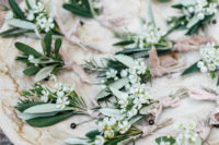 DIY wedding boutonnieres of blooms and greenery