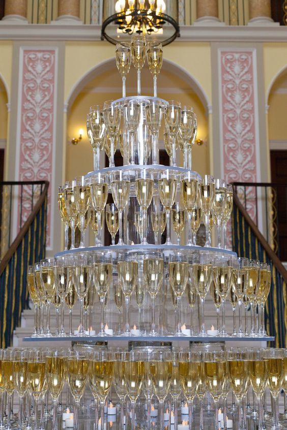 if you need a giant champagne tower but can't build it, look for a proper stand or stands for the glasses