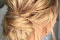 making such a messy low bun will take just a minute, leave some locks down to achieve an effortlessly chic look