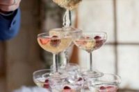 put some berries inside each glass to spurce up your champagne with a refreshing taste