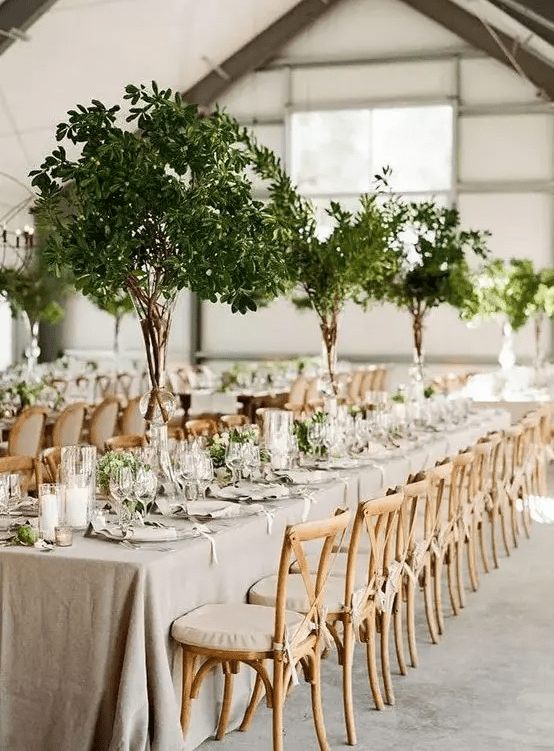 tall greenery centerpieces and matching greenery runners for a fresh and elegant spring look