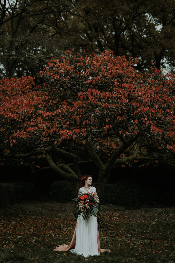 This dreamy fall candlelight wedding shoot took place at a real castle and in its garden