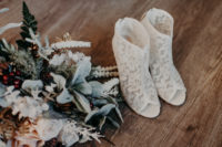 02 The bridal booties of white lace and with peep toes