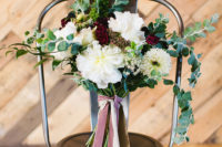 03 The bridal bouquet was a lush yet simple one, with burgundy and white blooms and pink and white ribbons